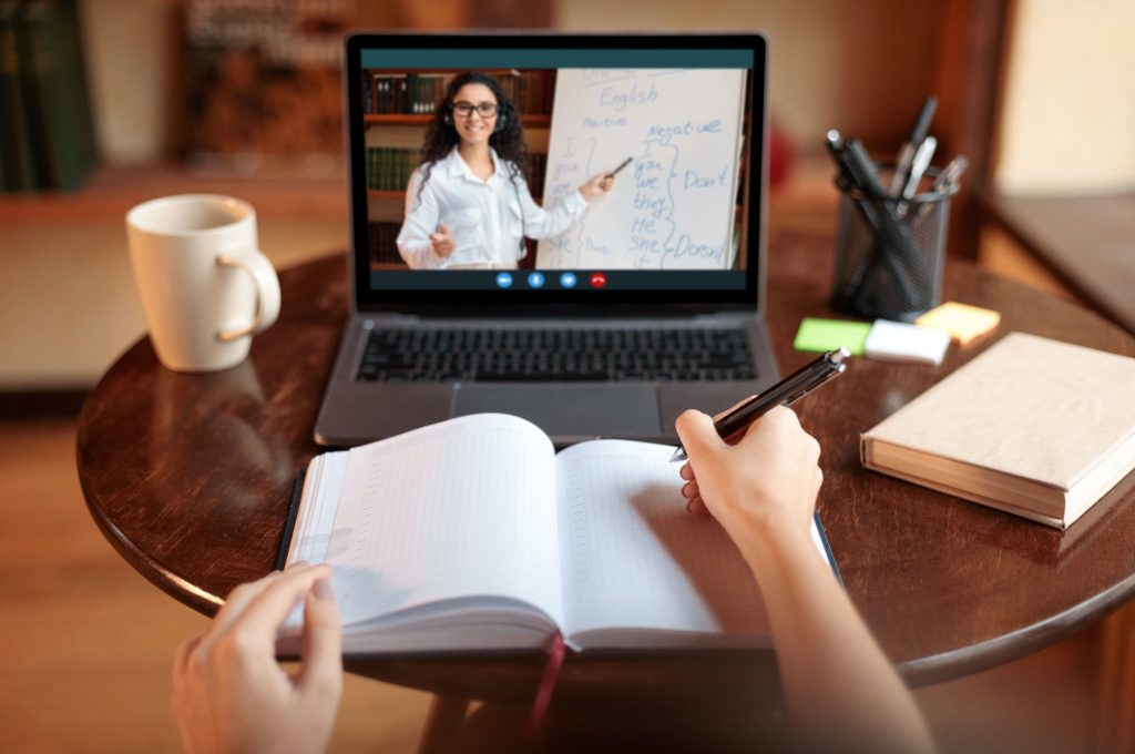 student-using-laptop-having-online-class-with-teacher-pov.jpg